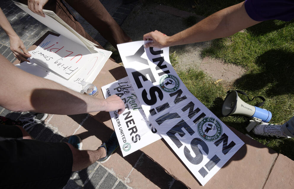 Placards reading “Union Yes!”