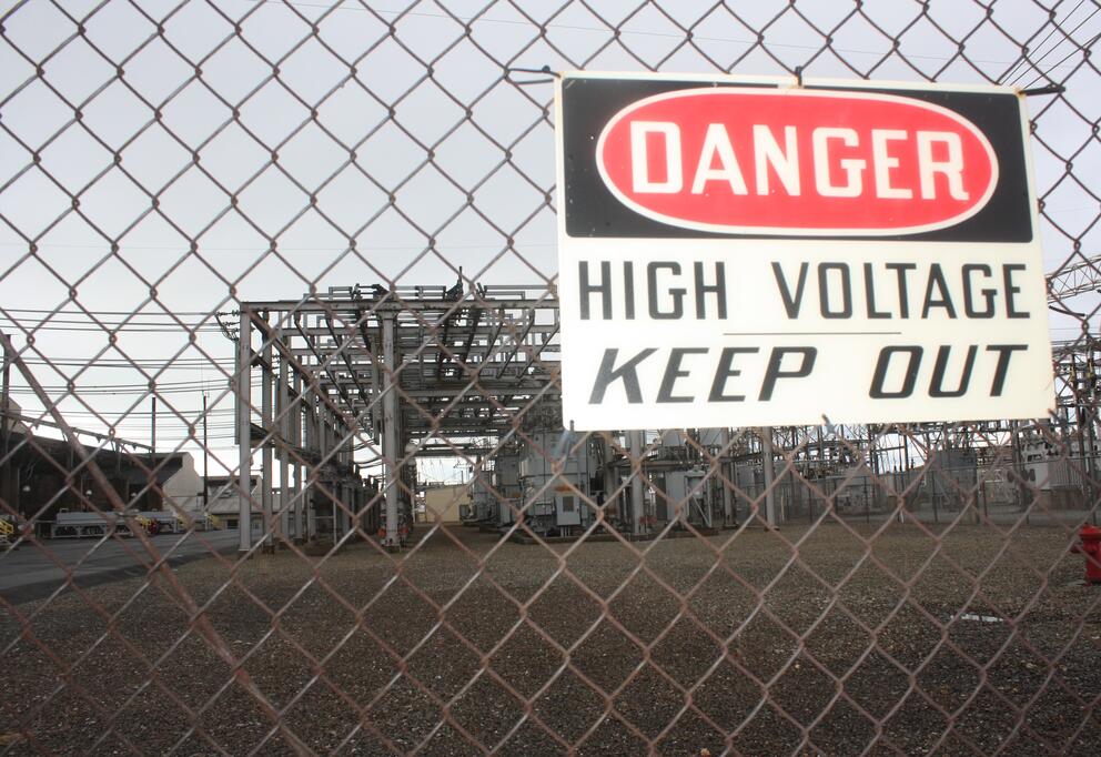 keep out sign on a fence