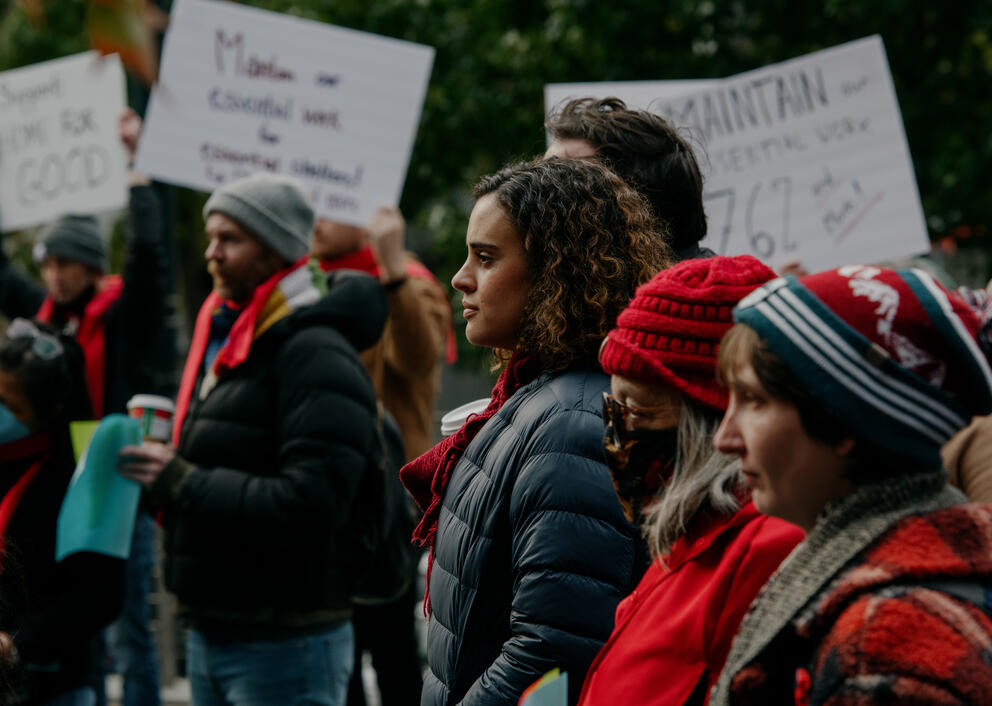 people gather outside of seattle city hall to lobby for higher social service worker contracts