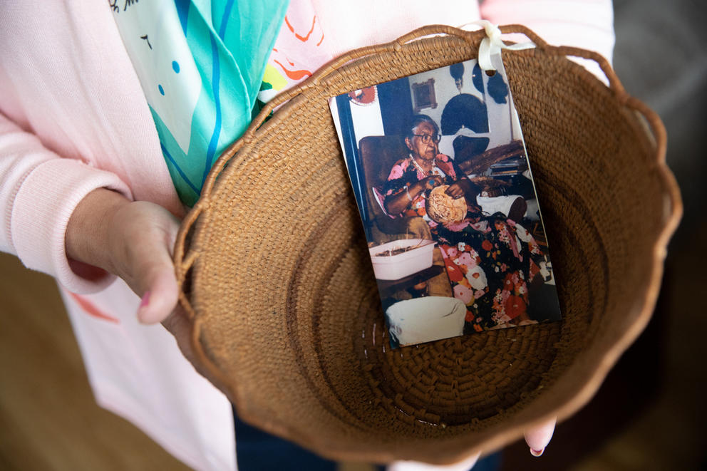Michelle Roberts holds a basket made by her grandmother