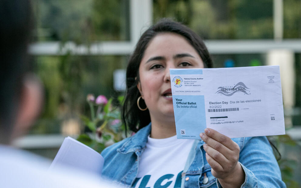 Candidate Dulce Gutierrez shows a ballot