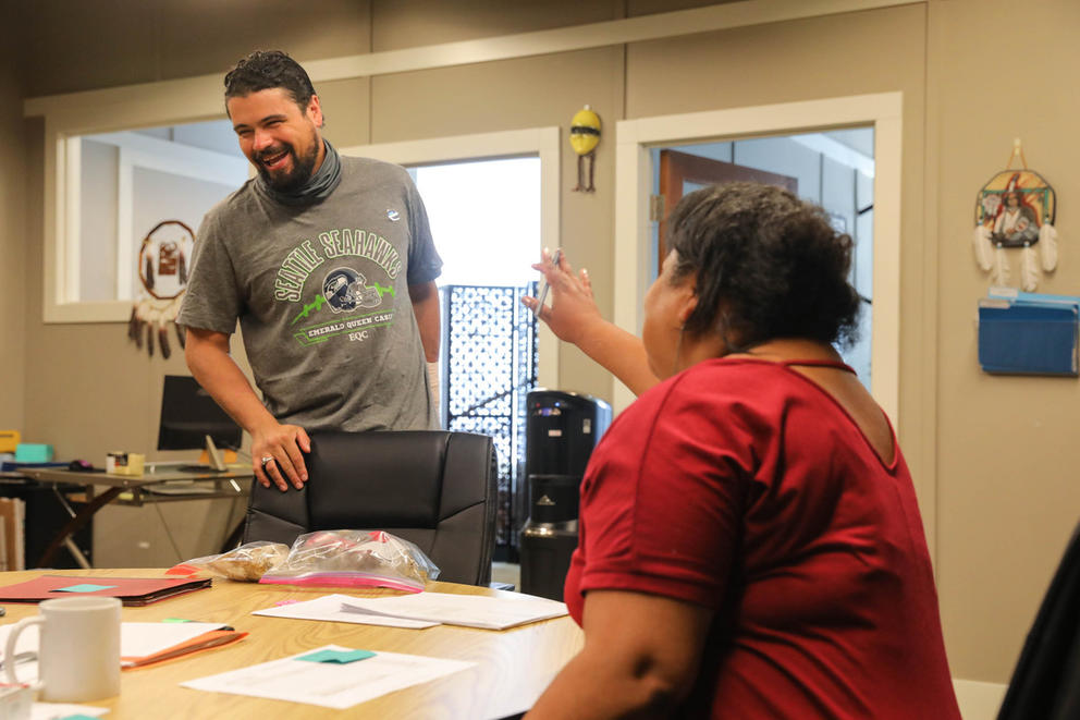 Winona Stevens, right, executive director of HEAL for Reentry, speaks with Doni Sumner