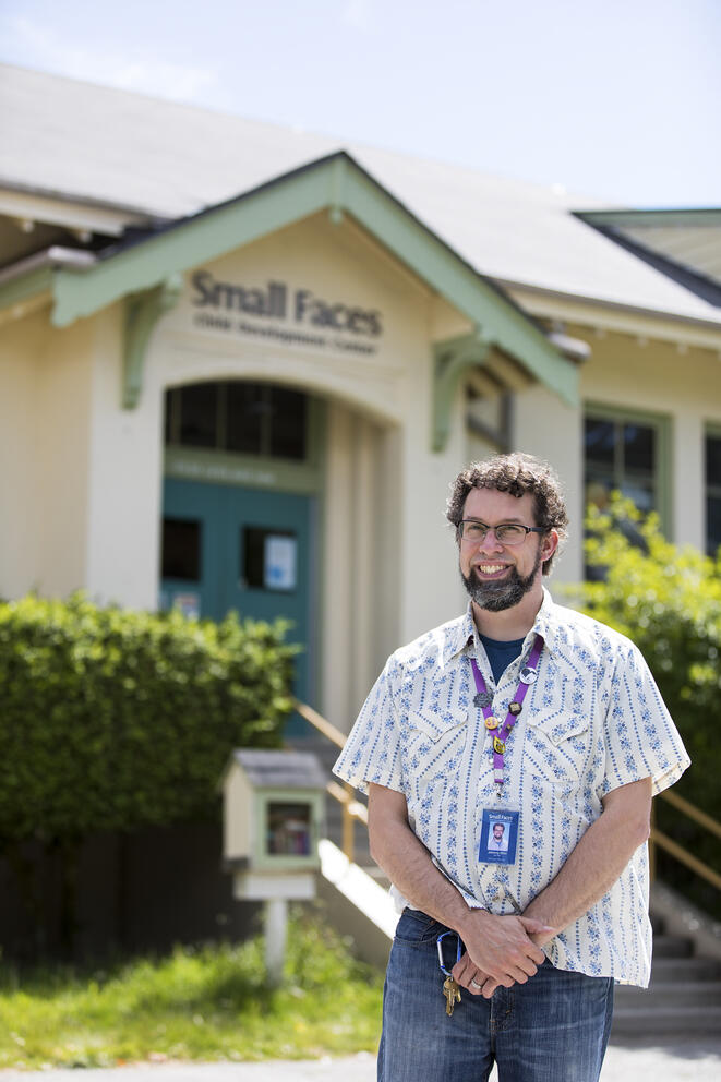 Man stands in front of building