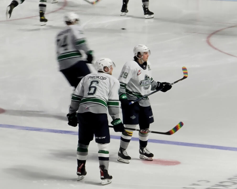 Luke Prokop and several players on the ice during warmup at the March 21 Thunderbirds game