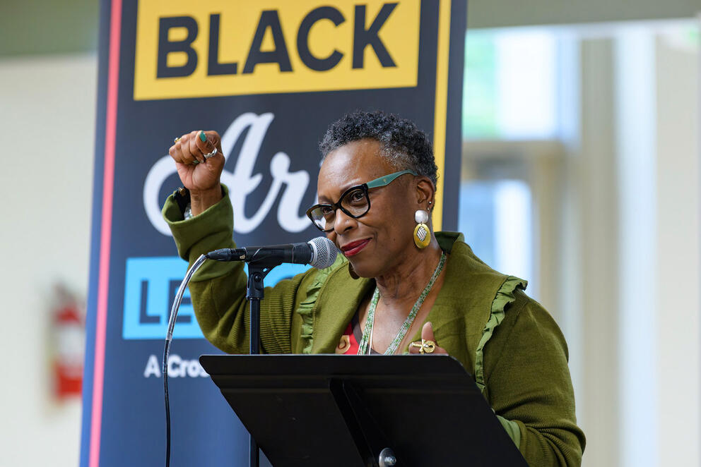 Vivian Phillips holding her fist up