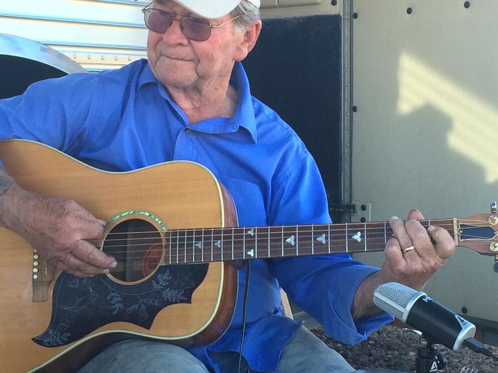 Playing country music on his guitar was another of the author's father's lifelong passions. 