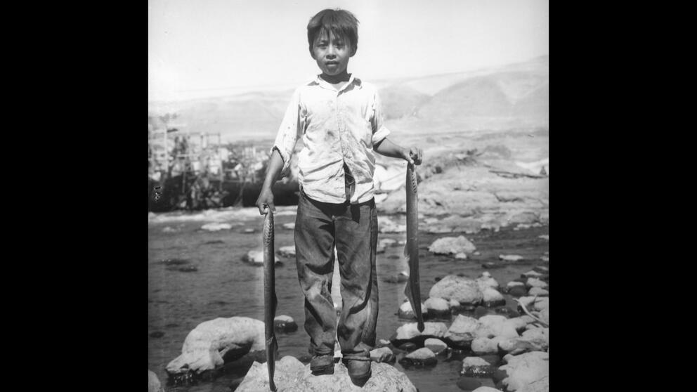 A boy with fish