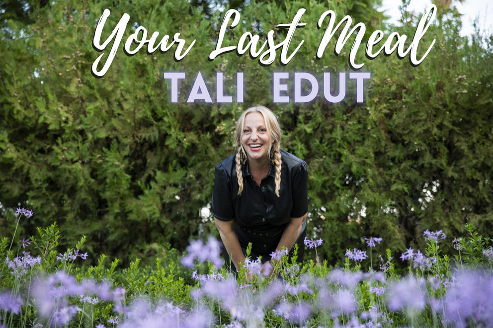 Tali Edut poses in a field of flowers