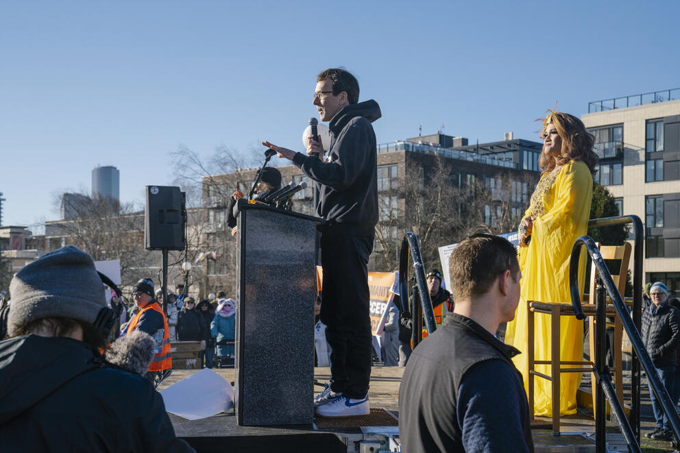 Bob Ferguson speaks to a crowd at a protest