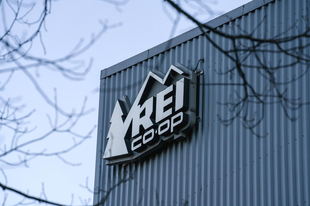 A photo of the REI Co-op logo outside the flagship store in Seattle.