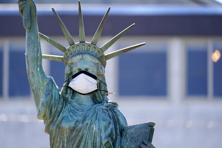 Statue with a face mask
