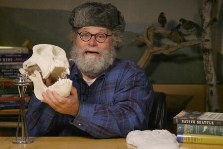 Knute Berger holds a skull